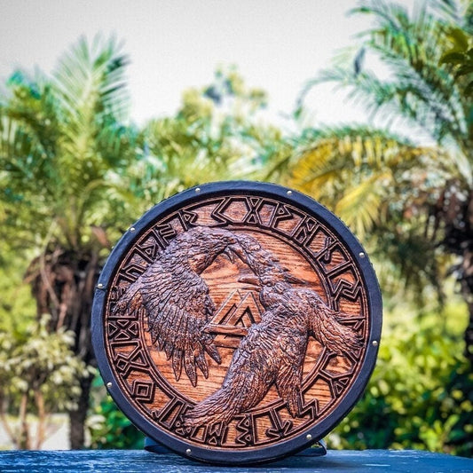 Hand-carved Viking shield featuring Odin's ravens Huginn and Muninn